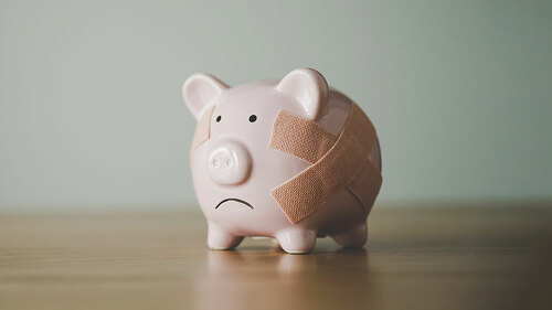 Piggy bank on wood table. Financial investment and save money concept