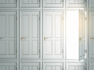Abstract white doors to success