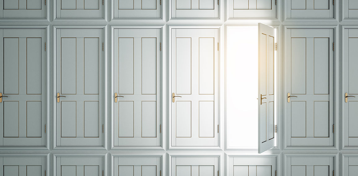 Abstract white doors to success