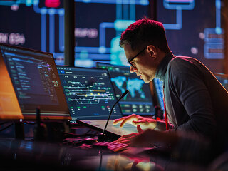 Professional IT Technical Support Specialist Making an Intercom