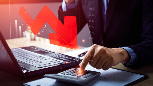 Business recession concept, crisis. business people analyzing sales data and the falling economic graph, Decreased funds and money. Fall of economy, capital reduction. Inflation. Falling income in GDP