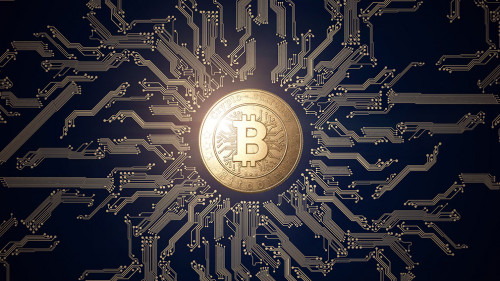 Gold coin Bitcoin on a black background. The concept of crypto currency. blockchain technology.