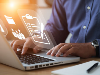 business people who use computers to manage documents online doc