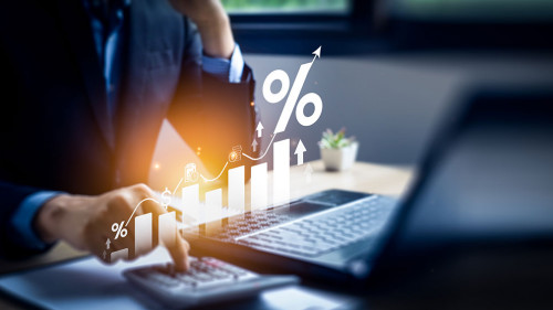 Interest rate and dividend concept, Businessman is calculating income and return on investment in percentage. income, return, retirement, compensation fund, investment, dividend tax, stock market