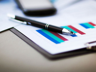 financial charts and graphs on the table