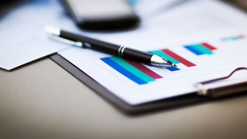 financial charts and graphs on the table