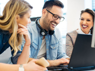 Group of business people and software developers working as a te