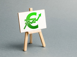 Information stand with a green Euro sign and up arrow. Increase profits and wealth. growth of wages, prices for manufactured and sold goods. Favorable conditions for business. Investment attraction