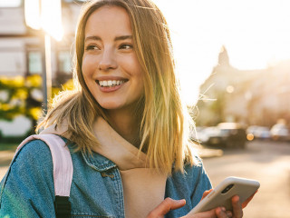 Beautiful young blonde woman wearing denim jacket