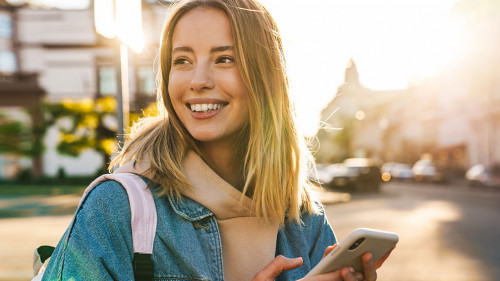 Beautiful young blonde woman wearing denim jacket
