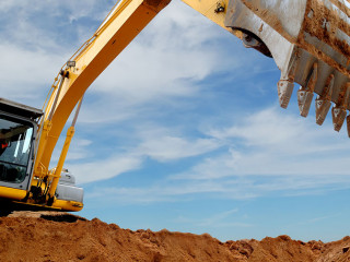 Excavator loader in sandpit