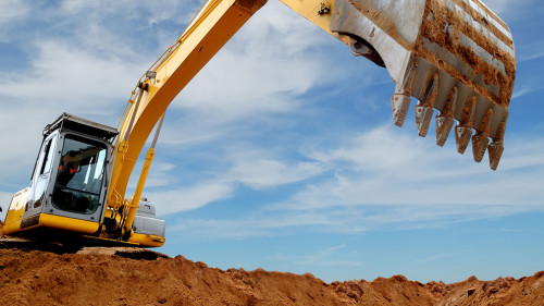 Excavator loader in sandpit