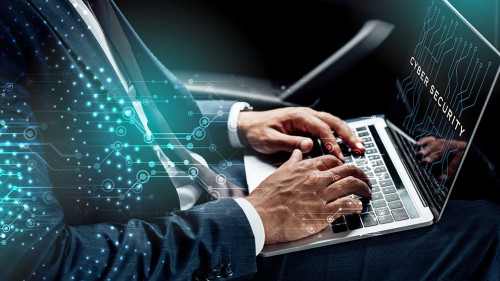 Anzugtraeger-Laptop-Cyber-Security-308529334-DP-IgorVetushko