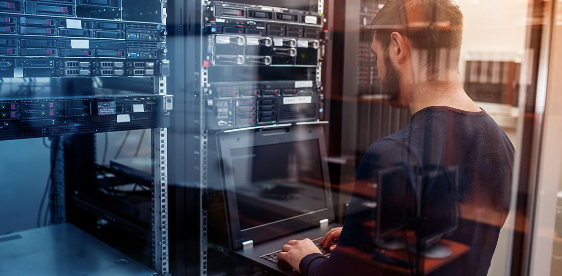 network engineer working in server room