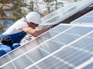 Installing solar photovoltaic panel system on roof of house