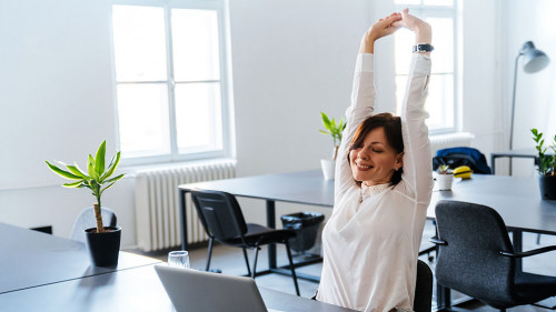 Smiling woman, living day, spare time in the office.