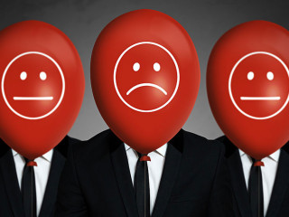 Businessmen with balloons