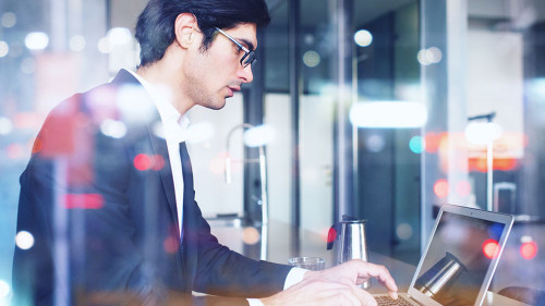 Businessman works at home with a laptop. concept of internet sharing. Double exposure