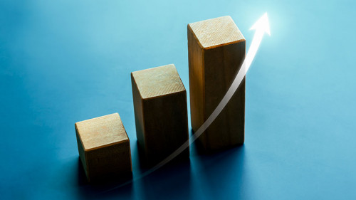 Shining rise up arrow on wooden cube blocks, bar graph chart ste