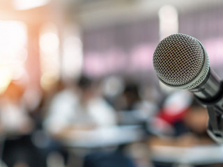 Microphone voice speaker in business seminar, speech presentatio