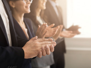 Business people hands applauding at meeting
