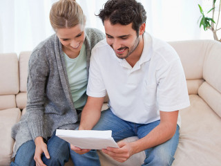 Couple reading a letter