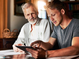 Heres a better explanation. two men working on a project together at home.