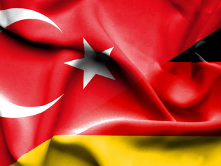 Waving flag of Germany and Turkey