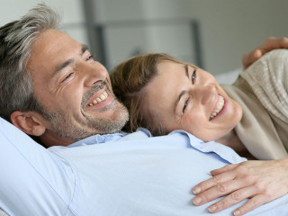 Mature couple relaxing in sofa, peaceful scene