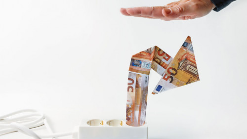 Power strip with rising arrow made of euro banknotes, hand from