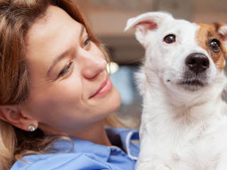 Friendly female veterenarian working at her clinic