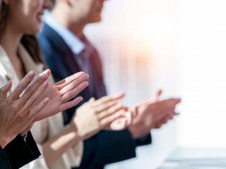 Business people applauding. Group of business people clapping in