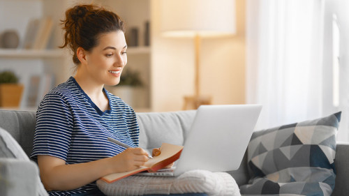 woman working on laptop at home
