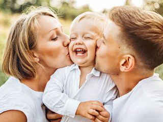 Young family with little son have fun outdoor