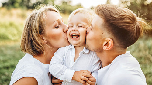 Young family with little son have fun outdoor