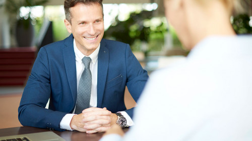 Financial advisor with client