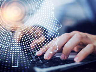 Businessman with computer background with brain theme hologram. Concept of brainstorm. Multi exposure.