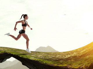 Woman running against natural landscape background