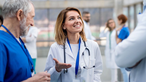 Group of doctors on conference, medical team discussing issues.