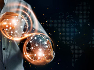 Man and abstract global networking connection in hands. Technolo