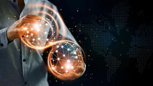 Man and abstract global networking connection in hands. Technolo