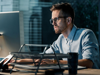 Man working late at night in office