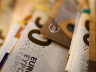Bundled euro banknotes with selective focus