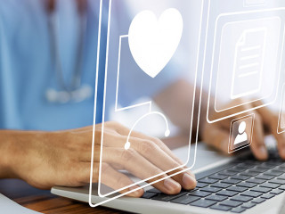 Doctor using technology document management on computer system m