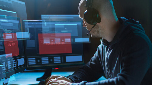 hacker with access denied messages on computers