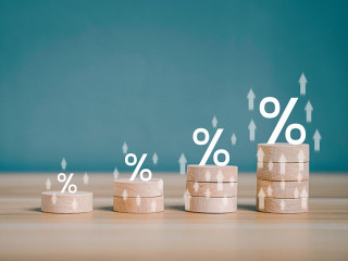 Interest rate financial and mortgage rates concept. Wooden block