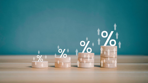Interest rate financial and mortgage rates concept. Wooden block