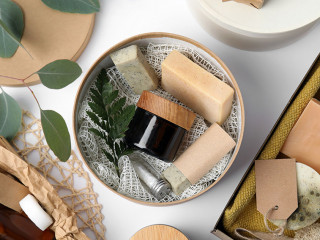 Cardboard boxes with eco friendly personal care products on whit