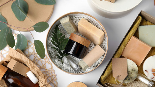 Cardboard boxes with eco friendly personal care products on whit