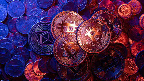 Shiny Bitcoin coins on piled up Ethereum and US Dollar coins